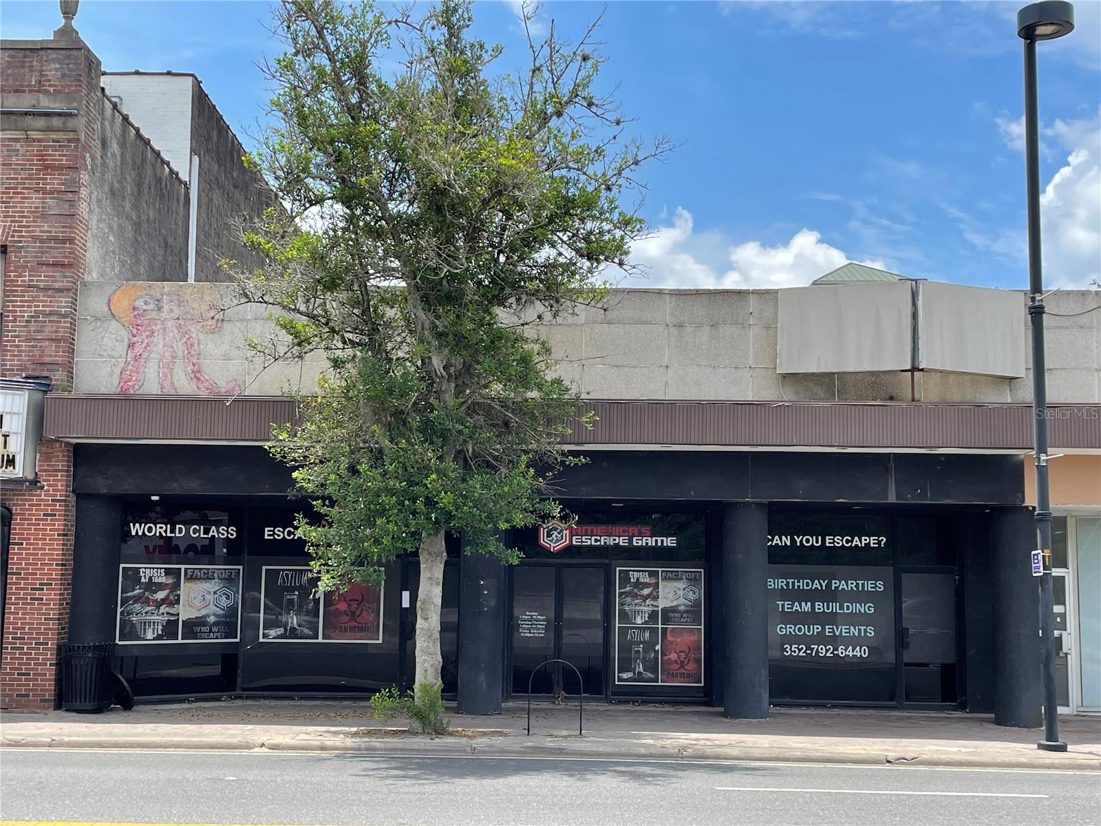 With direct University Avenue exposure, this space is ready for your next high profile business venture. As the former Escape Room venue, the interior is currently appointed with creative wall murals throughout and multiple designated "experience rooms" which could be demised to re-open to a larger space to accommodate your vision. This downtown location is ideal for retail, night club, or an office setting as it is only a few minutes stroll to restaurants, local and government businesses, lounge and music venues, and Sports Bar and Pool entertainment establishments. The space is also conveniently adjacent to one of the the Public Parking Garages.