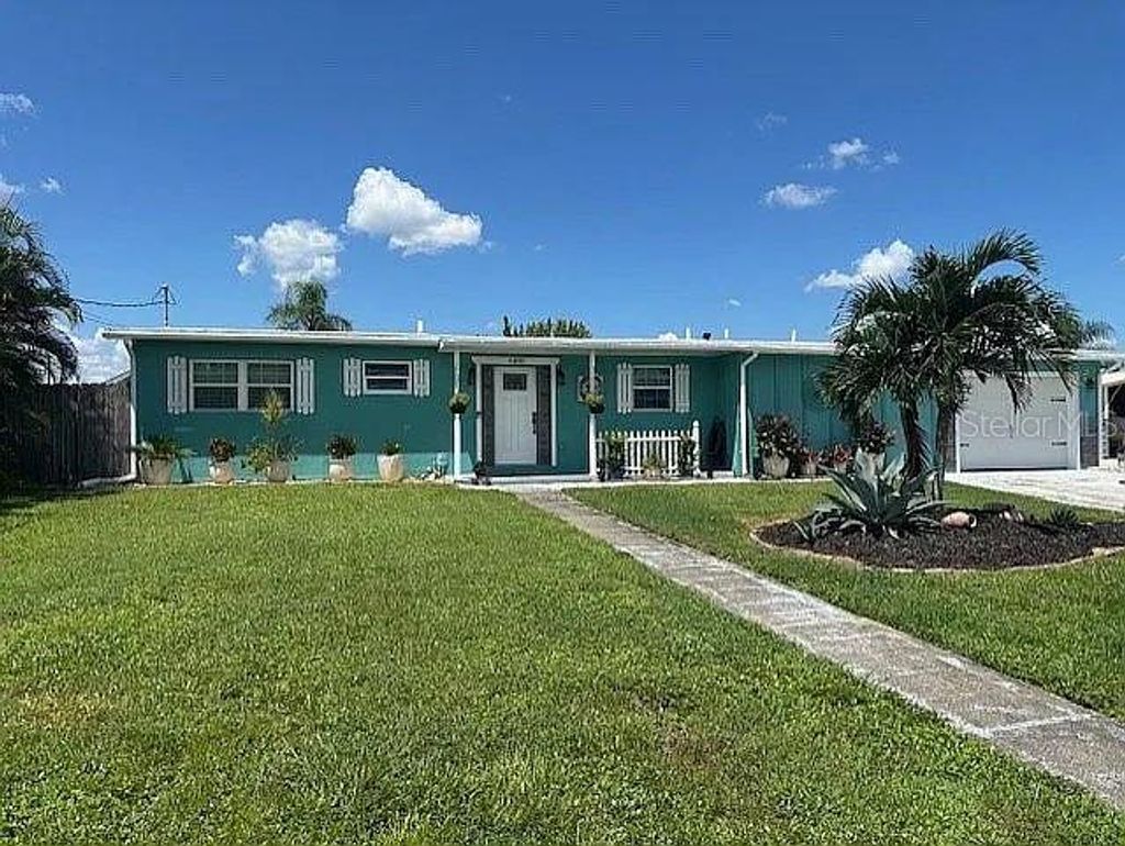 Photo of 6480 Angle Place, North Port, FL 34287 (MLS # O6347961)