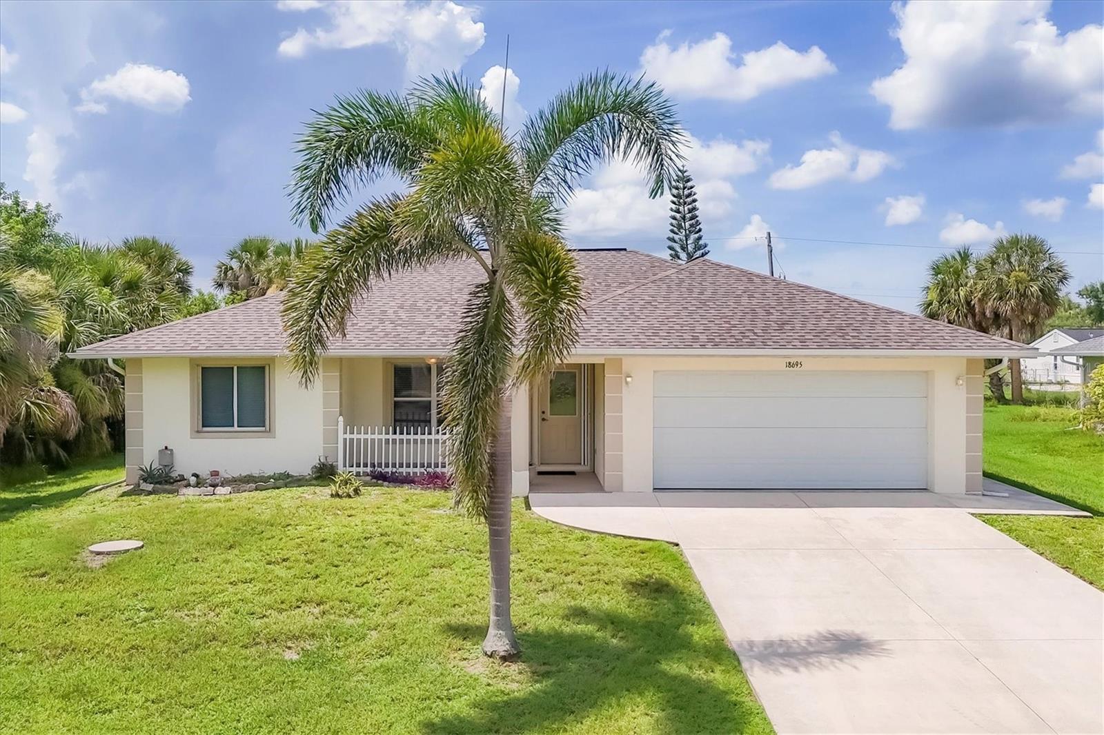 Welcome to this turn-key furnished beautifully maintained 3-bedroom, 2-bathroom home located in a quiet neighborhood of Port Charlotte that offers privacy without sacrificing easy access to local resources and nearby conveniences. Offering a light and open floor plan with neutral tile flooring throughout, this move-in ready home features a thoughtful layout perfect for comfortable living and entertaining. The well-appointed kitchen includes ample cabinetry, generous counter space, and a pass-through to the dining area, ideal for daily mealtime or hosting guests. A dedicated indoor laundry room adds convenience to daily life. A split floorplan offers privacy for residents and guests, while each of the three bedrooms offers plenty of natural light and closet space. The primary suite serves as a peaceful retreat with an en-suite bathroom for additional comfort and relaxation. The additional bedrooms are perfect for guests, a home office, or multi-purpose use. Step outside to an expansive and fully fenced backyard, offering the perfect space for pets, or outdoor entertaining. With room for a future pool or garden, this private outdoor space is a true highlight and invites you to add your own personal touch. Convenient to Gulf beaches, world-class golf courses, fishing and boating access, and an array of shopping, dining, and entertainment options, this home offers the best of Florida living in an ideal location. Whether you're a first-time buyer, part-time resident, or investor, this charming property offers comfort, value, and proximity to everything Port Charlotte and the surrounding areas has to offer. If the idea of a peaceful Florida retreat with easy access to a day’s entertainment is appealing to you, call today and schedule your private tour!