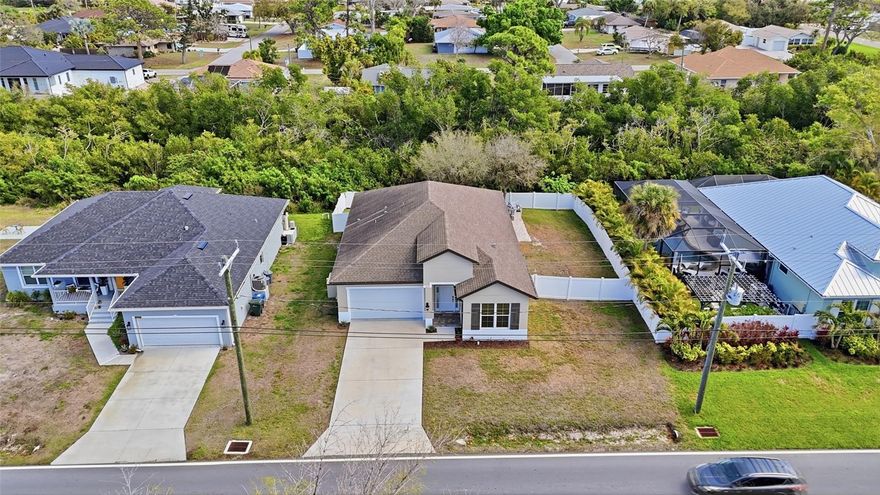 Welcome to 4437 Meridian Rd, a comfortable and thoughtfully laid out home in South Venice offering privacy, flexibility, and a location that makes everyday living easy.

Inside, the home features a bright open living area with high ceilings and tile flooring throughout. The split floorplan creates separation between the primary suite and guest bedrooms, giving the home a more functional feel for families, guests, or anyone working from home. The primary suite is tucked away on its own side of the house and includes two walk-in closets and an en-suite bathroom.

The kitchen opens naturally into the main living and dining spaces, creating a layout that feels connected without feeling crowded.

One of the standout features of this property is the backyard setting. The fully fenced yard backs up to preserve, offering added privacy and a peaceful natural backdrop rarely found at this price point. There is plenty of room for pets, outdoor entertaining, gardening, or simply enjoying the quiet surroundings.

Additional features include impact windows, a whole-house reverse osmosis water system, and no HOA or deed restrictions, giving owners more flexibility and fewer limitations.

Located approximately 10 minutes from both Manasota Key Beach and historic Venice Island, the home offers convenient access to beaches, restaurants, shopping, parks, golf courses, and the Venetian Waterway Trail. Whether heading to the Gulf for sunset, biking along the Intracoastal, or enjoying downtown Venice, this location keeps you close to it all while still feeling tucked away.

4437 Meridian Rd offers a practical layout, privacy, and a location that continues to attract buyers looking for the South Venice lifestyle.