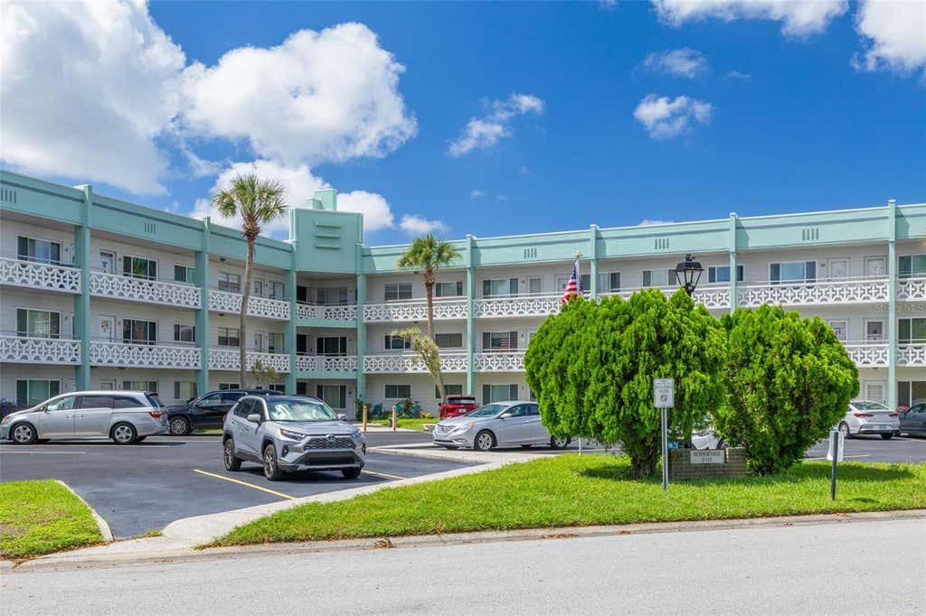 Photo of 2455 Finlandia Lane #63, Clearwater, FL 33763 (MLS # TB8538048)