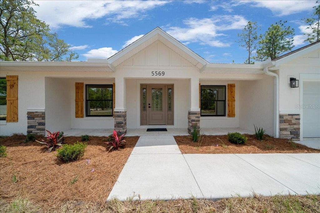 Photo of 5569 SW 121st Terrace, Ocala, FL 34481 (MLS # OM723564)