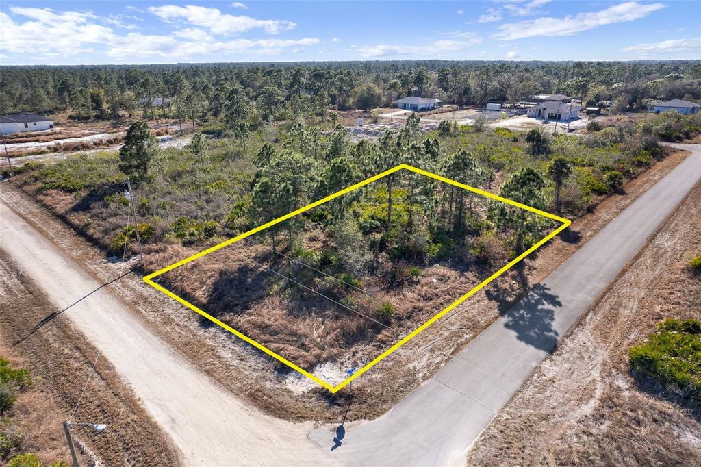 Photo of Corner Lot, Lehigh Acres, FL 33972 (MLS # O6385262)
