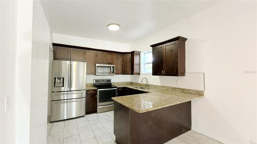 Photo of 2332 W Pine Street, Tampa, FL 33607 (MLS # TB8478248)