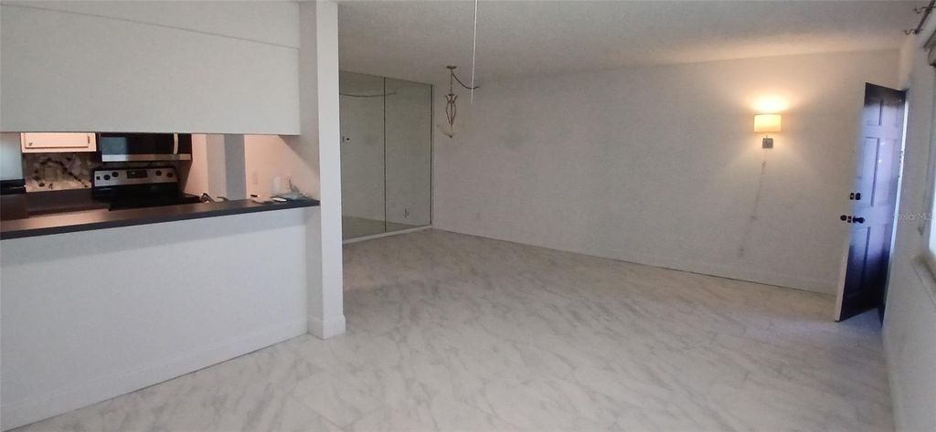 Photo of 2525 W Bay Drive #D23, Largo, FL 33770 (MLS # TB8441631)