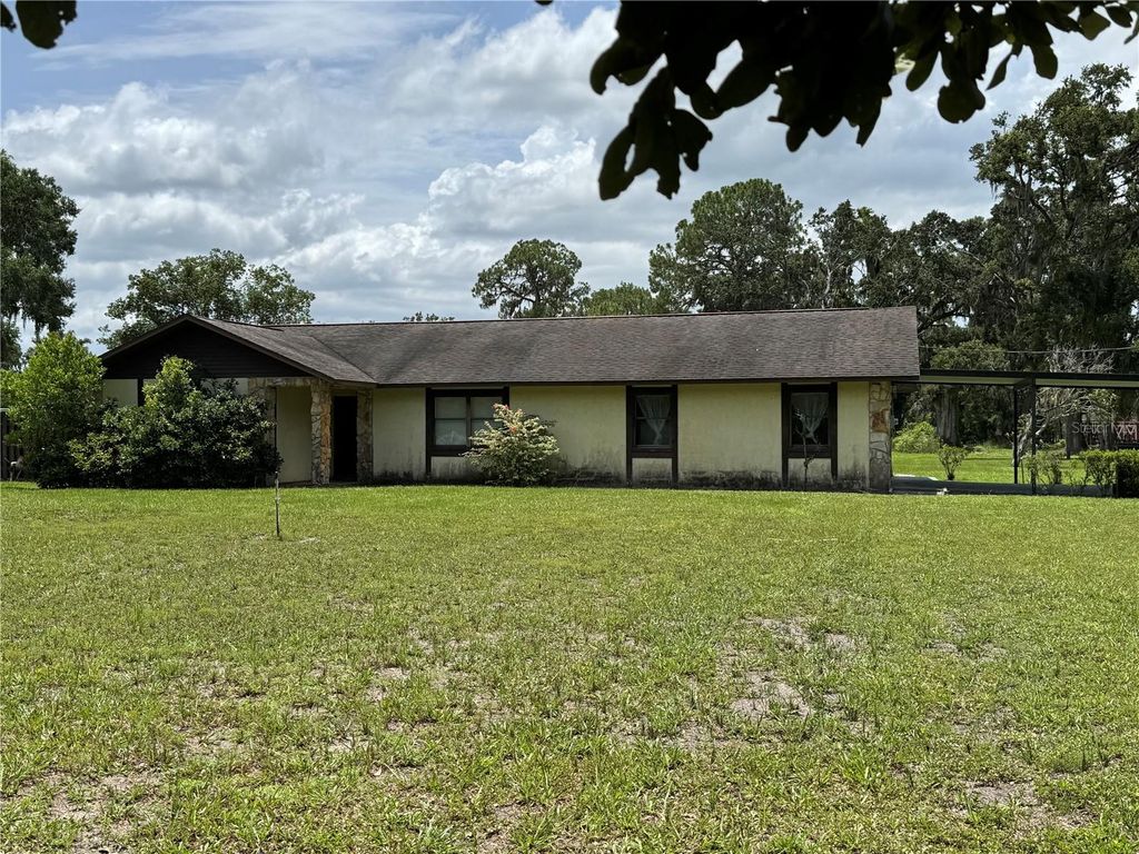 Photo of 5407 W Knights Griffin Road, Plant City, FL 33565 (MLS # TB8407561)