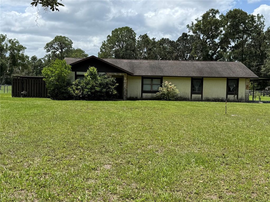 Photo of 5407 W Knights Griffin Road, Plant City, FL 33565 (MLS # TB8407561)
