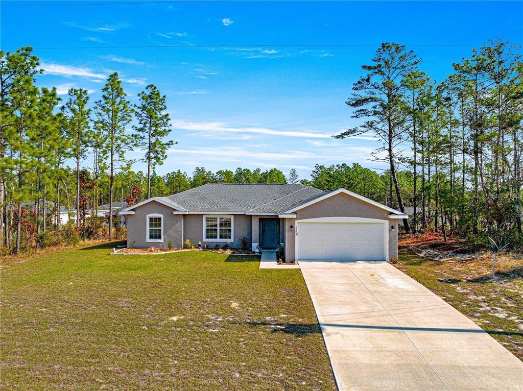 Photo of 13057 SW 85th Circle, Ocala, FL 34473 (MLS # OM716042)