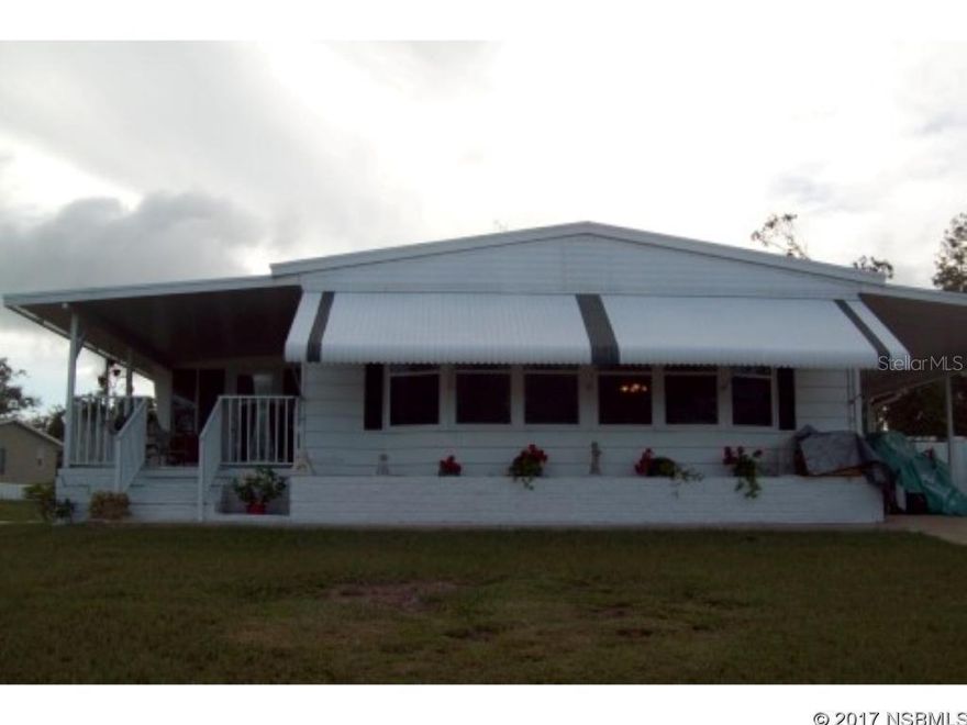 This beautiful remodeled home in 55+ community with no lot rent hoa is  20.00 a year. Sitting on a corner lot at the beginning of a cul da sac. Open floor plan with new kitchen. Which includes new cabinets, sink, island,  counter tops, and top of the line maytag stainless steel appliances. Nice subway backslash tile and new hardware on all doors.  New flooring throughout the entire home. Lots of built ins including hutch in dining area. New vanity and toilet in the main bathroom. Master bathroom has new double sinks, faucets and walk in shower. Sit out on your florida room with new laminate or your porch in the morning drinking coffee. 2 carports one on each side of home with attached shed. Fence runs along back side of property and nice patio off carport. Roof over with reinforced screws and newer windows. New electric box which also has underground electric. ;Water: City