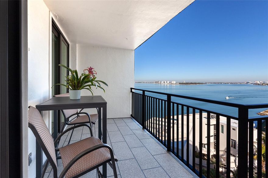 If you are dreaming of the ultimate condominium with jaw-dropping Gulf, Sarasota Bay, and City Views, this is the one! No detail was overlooked in the design and layout of this incredible condo. Modern luxury on prime north Siesta Key Oceanfront. Positioned on the 10th floor, with unsurpassed panoramic views of the Gulf, Sarasota Bay, the skyline of Sarasota, Lido Key, Big Pass and beyond. Watching dolphins and spectacular sunsets are some of the seller's favorite bonuses. Spacious open floor plan, which includes most of the high-end furnishings. One-bedroom, one-bathroom home in the sky that defines style. Masterfully renovated, maximizing spaces and views from every room. The modernization of the unit included a full remodel: Hurricane-resistant sliding glass doors, a completely new kitchen, including European style cabinets with soft-touch closing, convenient pullouts for storage, large porcelain wall tile, granite counters, triple filter osmosis water dispenser, and a full appliance package. Waterproof luxury wide vinyl plank flooring throughout. All new bath with dual sinks, shower with frameless shower doors, and water closet. A modern frosted glass barn door was added for additional access to the bedroom. A newer electrical box with updated GFI wiring will give a new owner peace of mind. Motorized privacy blinds on the sliding glass doors, with a touch of a remote. 4822 Ocean Blvd has had extensive updates recently, including a remodeled social/club room, fitness center, heated waterfront pool, outdoor grills within an extra-large Cabana, fishing pier, social pier, bicycle storage room, and new terraces and railings on every condominium. In 2021, a modern lobby was created with high-end furnishings, and a secured entrance, featuring a new updated security system for the community. A new sea wall has just finished being constructed, and two new piers are almost completed; Expected completion date is the end of February, 2026. Be sure to ask about the covered parking process; assigned parking, with extra parking behind gates, including guest parking. Additional amenities include a secured fishing room to store fishing equipment, and a large park. Wi-Fi, cable, water, and trash, and more are included in the HOA fee. Located within a short walk to Siesta Key Village, and Siesta Key Beach. Enjoy all the Island has to offer with its restaurants, bars, and shopping at various boutiques. There’s also a weekly farmer’s market. Be sure to check out the VIRTUAL TOURS on this property and see why you’ll fall in love with this exceptional Gulf-front gem! Come for the views and stay for the fun!
