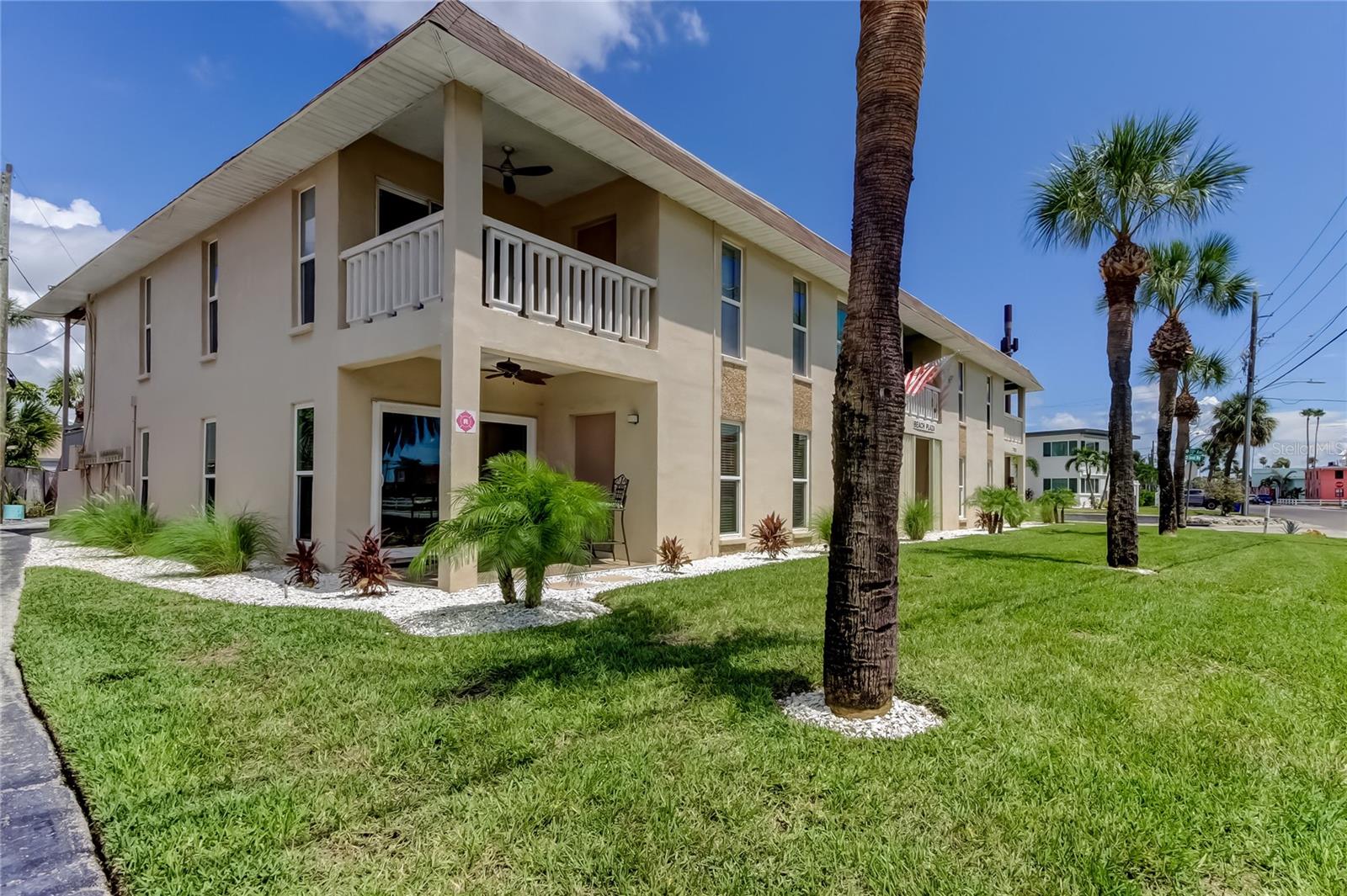 Luxury meets the beach!! Amazing location for your beach lifestyle! This beautifully updated light and bright two bedroom/two bath furnished end unit condo is steps from the sugary sands, turquoise waters and stunning sunsets of St Pete Beach. Wonderfully decorated throughout, featuring a gourmet kitchen with exquisite granite counters, solid cherry wood cabinetry with ample storage, Viking appliances, a farmhouse sink and built in pantry. An open plan living and dining area leads to a peaceful covered porch where you can’t help but relax. A spacious primary bedroom with en-suite bath even has a slight peekaboo water view. This home will be your private beach oasis where the stress melts away in the warm sunshine and gentle breezes of one of the best beaches in the country. This condo has a 23 seer Bryant AC with UV light system, updated electric panel and hurricane impact doors and windows including a gorgeous entry door with three point locking system. This well maintained community is right in the heart of the thriving Upham Beach neighborhood. Cap each evening off with a short stroll to watch yet another amazing sunset!! Within a few blocks are a number of dining options with water views, Fisherman’s park on Blind pass, and Corey avenue with the Sunday market and festivals. Also living so close to The charm of the historic Don Cesar Hotel and Pass-A-Grille neighborhood as well will have you falling in love with your new coastal hometown. So Convenient to St Petersburg’s downtown dining and arts scene, New bay front pier, major league sports, Downtown Tampa and Tampa Intl. and St Pete Clearwater Airports. St Pete Beach is tops on every list for sun, sand, fun and an amazing lifestyle. You deserve to live on one of the best beaches in the world. Start today!!
