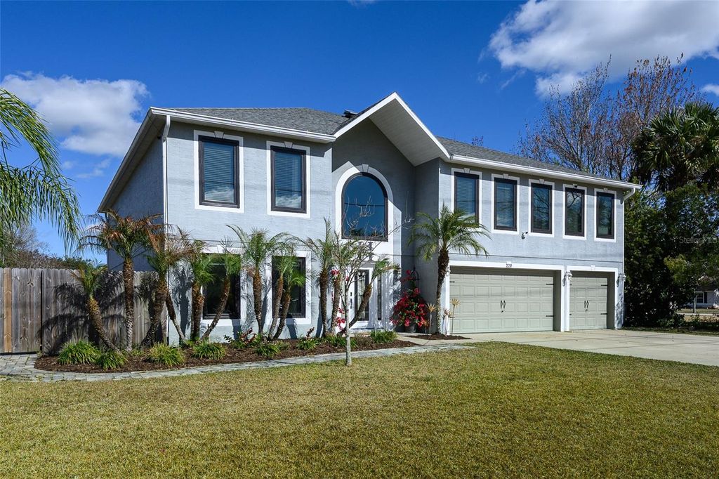 Photo of 220 Bird Of Paradise Drive, Palm Coast, FL 32137 (MLS # FC315643)