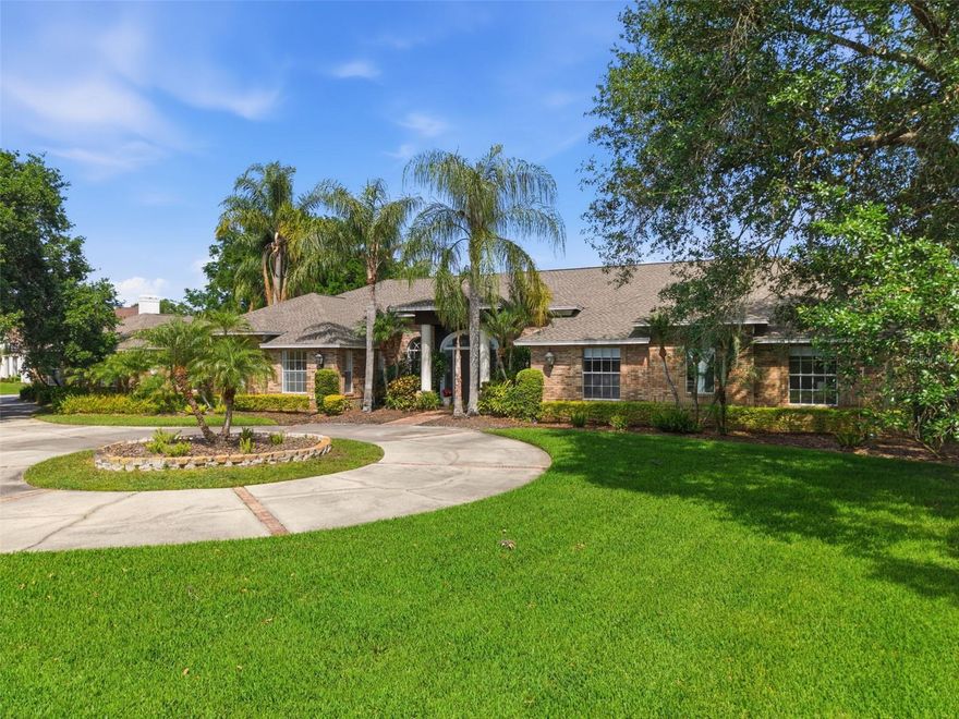 One or more photo(s) has been virtually staged. Located on one of the most exclusive streets.......Welcome to 18701 Pepper Pike in Cheval Golf and Counrty Club.
A rare opportunity to own a 6,200+ sq ft estate on over an acre—perfectly positioned on Hole 1 and enveloped in lush, mature landscaping that creates a private, garden-like sanctuary. Tucked behind a fully fenced setting with beautiful greenery, the property offers a level of privacy rarely found, evoking the feeling of a secluded secret garden retreat within one of Tampa’s most sought after gated communities.
From the moment you arrive, the home’s scale and presence are undeniable. Inside, a grand yet inviting layout unfolds with 6 bedrooms, 4.5 bathrooms, and a collection of thoughtfully designed living spaces ideal for both elegant entertaining and everyday comfort. Formal living and dining rooms set a refined tone, while the expansive game room with a striking brick fireplace and a dedicated bonus/theater room provide exceptional flexibility for hosting and relaxation.
Designed with both functionality and privacy in mind, the home features distinct living wings. The primary wing serves as a true retreat, offering the luxurious owner’s suite along with three additional bedrooms—two connected by a Jack-and-Jill bathroom and one with its own private en suite—creating an ideal configuration for family living. A separate guest wing includes two additional bedrooms joined by a beautifully appointed Jack-and-Jill bathroom, perfectly suited for guests, extended family, or a quiet home office environment.
At the heart of the home, the spacious kitchen flows seamlessly into a large family room anchored by a grand brick wood-burning fireplace, creating a warm and welcoming central gathering space. LVP flooring throughout the bedrooms, living room, and family room adds a clean, modern touch while maintaining durability and style.
The primary suite is a true sanctuary, highlighted by a fully renovated, spa-inspired bathroom (2023). All guest bathrooms have also been tastefully updated (2023) with timeless finishes, offering a cohesive sense of understated luxury throughout.
Step outside to a private resort-style setting where a lagoon-style pool with a dramatic rock waterfall and hot tub serves as the centerpiece of an expansive lanai with over 3000 sq ft of entertaining space.Outside of the lanai is surrounded by mature landscaping and open green space, the backyard is designed for both peaceful relaxation and effortless entertaining.
Recent improvements include a new ROOF (2022), three HVAC systems (2022), and a TANKLESS HOT WATER HEATER (2023), providing modern comfort and peace of mind.
As a resident of Cheval Golf & Country Club, enjoy access to exceptional amenities including a clubhouse with dining, tennis courts, fitness center, and swimming facilities, all within a 24-hour manned gated community. The championship golf course is private and available by optional membership.
Ideally located within the highly sought-after Steinbrenner school district, Cheval offers a premier lifestyle just minutes from top-rated dining, shopping, and major highways, with convenient access to downtown Tampa and Tampa International Airport—both approximately 20 minutes away.
Offering exceptional value for its size, setting, and location, this is a rare opportunity to secure a true estate property in Cheval—where homes of this scale and privacy seldom come to market.