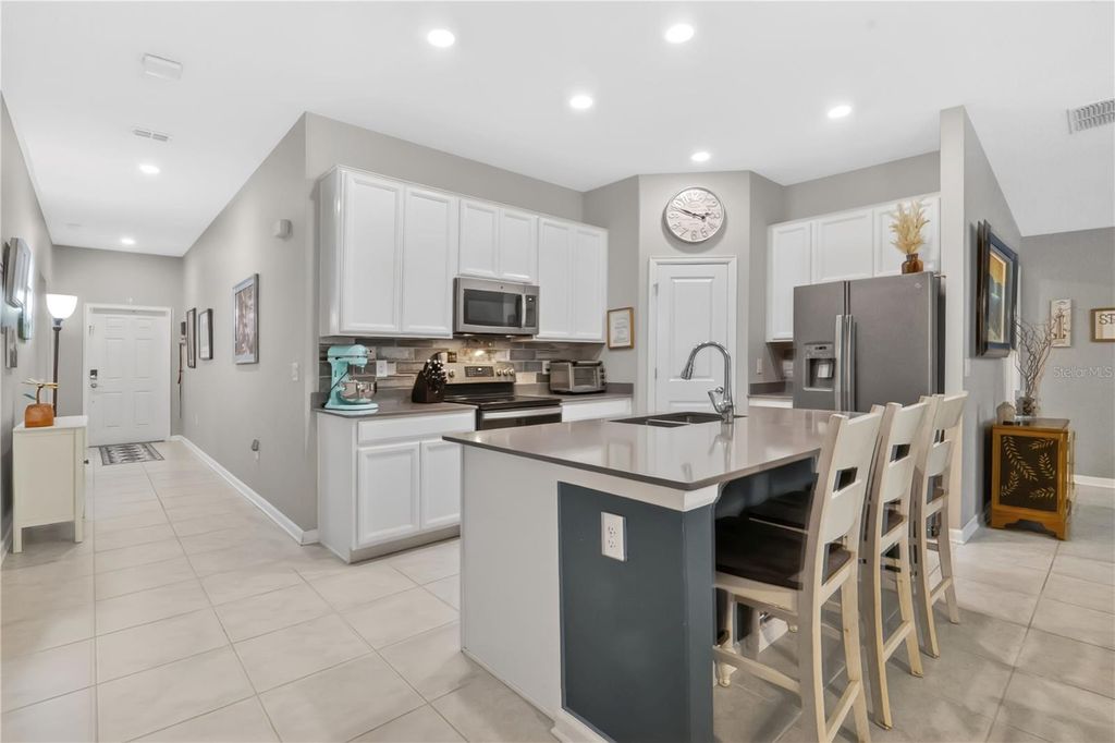 Photo of 16467 Glassy Loch Loop, Clermont, FL 34714 (MLS # O6401883)