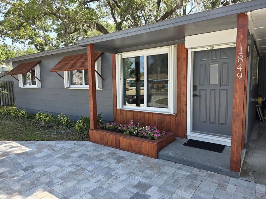 Beautiful home in the very popular Dunedin Isle area. Three bedrooms of good size and one bath. Home has been updated with new porcelain flooring. Unique wooden countertops and Island . Large Family room with views of the back yard which opens up to the trail to Hammock Park. Pinellas Trail is right down the block. Large Screened Porch for entertaining. Circular driveway and a spacious carport. Lawn service included in rent. The home is completely furnished just bring your toothbrush and enjoy the many activities of Downtown Dunedin. Many Restaurants and Breweries .Clearwater beach and Dunedin Beach are minutes away.
