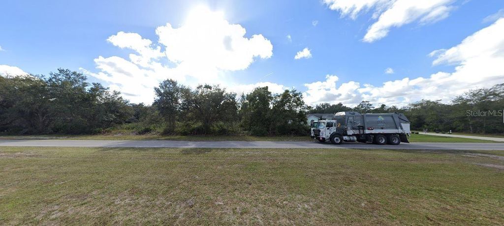 Photo of 711 El Dorado Drive, Indian Lake Estates, FL 33855 (MLS # O6272133)