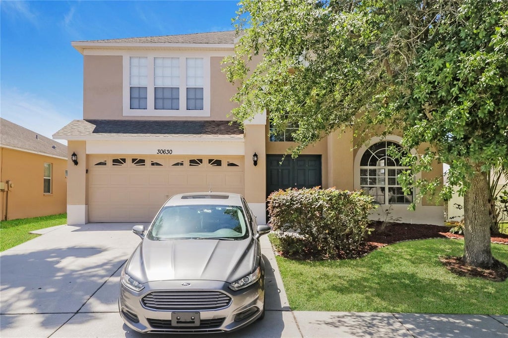 Photo of 30630 Annadale Drive, Wesley Chapel, FL 33545 (MLS # C7531002)