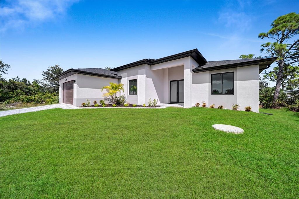 Photo of 14020 Chesswood Lane, Port Charlotte, FL 33981 (MLS # TB8440574)