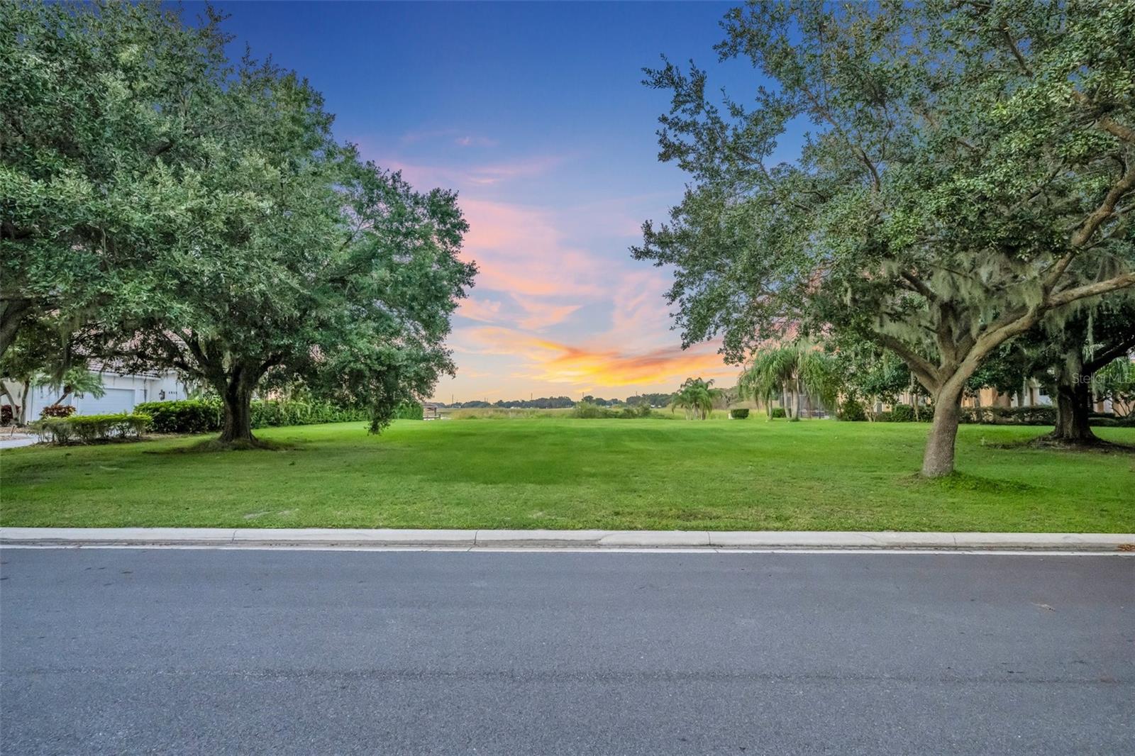DIRECT LAKE ACCESS TO LAKE TOHO | LARGEST LAKE IN CENTRAL FLORIDA | GATED COMMUNITY | DISNEY FIREWORK VIEWS | This exceptional property boasts a prime location within the sought-after Sunset Pointe community, overlooking the expansive 22,700-acre Lake Tohopekaliga. This stunning lake is renowned as one of the nation's premier bass fishing destinations, consistently delivering more trophy-sized bass than any other waterway in the country. Imagine building your dream home here, complete with your very own dock for easy access to the Gulf of Mexico or the Atlantic Ocean right from your backyard. What's more, you'll be treated to an unrivaled view of Disney's fireworks show across the lake. And as the day draws to a close, prepare to be mesmerized by the breathtaking sunsets that grace this remarkable setting. We're here to help you make your vision a reality, whether by connecting you with a skilled builder or accommodating your own preferences. With the lot primed for construction, you'll have the opportunity to savor all the luxury and natural beauty this unique location has to offer. Stop dreaming and start living – this is your chance to experience a life of unparalleled luxury and outdoor adventure on this exceptional lake.