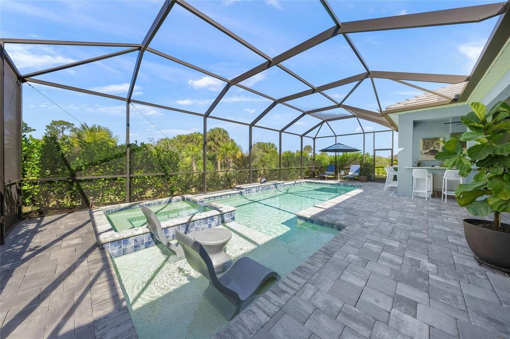 Photo of 10345 Canaveral Circle, Sarasota, FL 34241 (MLS # A4684154)