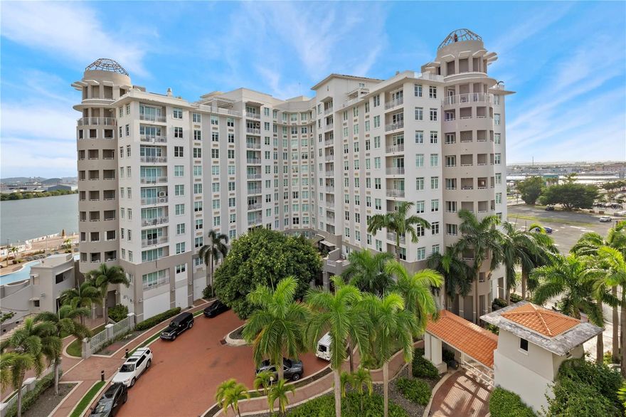 Experience the perfect fusion of sophistication and modern convenience in this ultra-stylish residence at Capitolio Plaza, one of San Juan’s most coveted urban addresses. Positioned directly across from BahÃa Urbana and steps from the entrance to Old San Juan, this impeccably remodeled apartment captures panoramic views of the San Juan Bay and Harbor, offering a daily backdrop of sailboats, sunsets, and city lights.
Every detail has been thoughtfully curated—from sleek glass and hardwood partition walls that define the guest bedrooms, to a refined office nook and an additional fully remodeled bathroom. The owner’s suite evokes hotel-level indulgence, featuring a spa-inspired bathroom with double walk-in showers, designer fixtures, and clean architectural lines. Spanning 1,754 square feet, the residence showcases an open-concept layout anchored by a state-of-the-art kitchen equipped with premium, energy-efficient appliances, custom cabinetry, and an inviting breakfast nook overlooking the bay. Additional features include a dedicated laundry room with full-size washer and dryer, utility sink, and built-in organizers.
This home includes two same-floor private storage rooms and two deeded parking spaces with the option to install EV chargers—a rarity in Old San Juan living. Capitolio Plaza further enhances daily comfort with 24-hour security, a full-power backup generator, and a water cistern. Residents enjoy a resort-inspired amenity collection: a pool deck with cabanas overlooking the bay, a rooftop fitness center, tennis and basketball courts, and even a private running track—a rare urban luxury in San Juan. Family-friendly amenities include a kiddie pool and playground, while the best of the city—fine dining, cultural landmarks, marinas, and entertainment—is just steps away.
Capitolio Plaza stands at the crossroads of history and modernity—a place where waterfront tranquility meets the vibrancy of the city, offering a lifestyle as dynamic as San Juan itself.