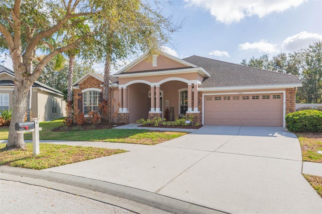 Photo of 7051 Derwent Glen Circle, Land O Lakes, FL 34637 (MLS # TB8478286)