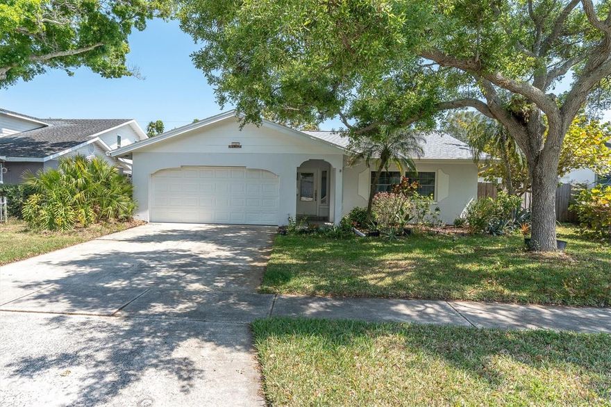 One or more photo(s) has been virtually staged. One or more photo(s) has been virtually staged. Welcome to your dream home in the City of St. Petersburg, Florida! This beautifully renovated 4-bedroom, 2-bath residence offers 1,671 sq. ft. of thoughtfully updated living space, blending modern style with functional, everyday comfort. Step inside to an inviting open-concept layout featuring a stunning, fully updated kitchen with sleek Shaker cabinets, solid surface countertops, a full-height backsplash, and a convenient breakfast bar—perfect for casual dining or entertaining. The home showcases luxury vinyl plank flooring, fresh interior paint, and newly installed baseboards throughout for a clean, cohesive look. Both bathrooms have been tastefully remodeled with floor-to-ceiling tiled showers and stylish glass doors, creating a spa-like atmosphere. The recently replaced roof offers peace of mind, and improvements have been permitted. Enjoy true move-in-ready convenience with included appliances: refrigerator, gas stove, dishwasher, microwave, washer, and dryer. Relax in the cozy living area or unwind on the screened lanai, where you can enjoy a fully fenced yard with mature landscaping, providing privacy and plenty of space that enhances Florida living at its best. Ideally located just 5 miles from downtown St. Petersburg, about 25 minutes to Tampa International Airport, and with easy access to world-renowned Gulf beaches, this home offers the perfect balance of convenience and tranquility. Plus, Denver Park is just two blocks away, featuring tennis, pickleball, basketball, volleyball, a baseball field, picnic areas, and a playground. Don’t miss your opportunity to own this meticulously updated home—schedule your private showing today!