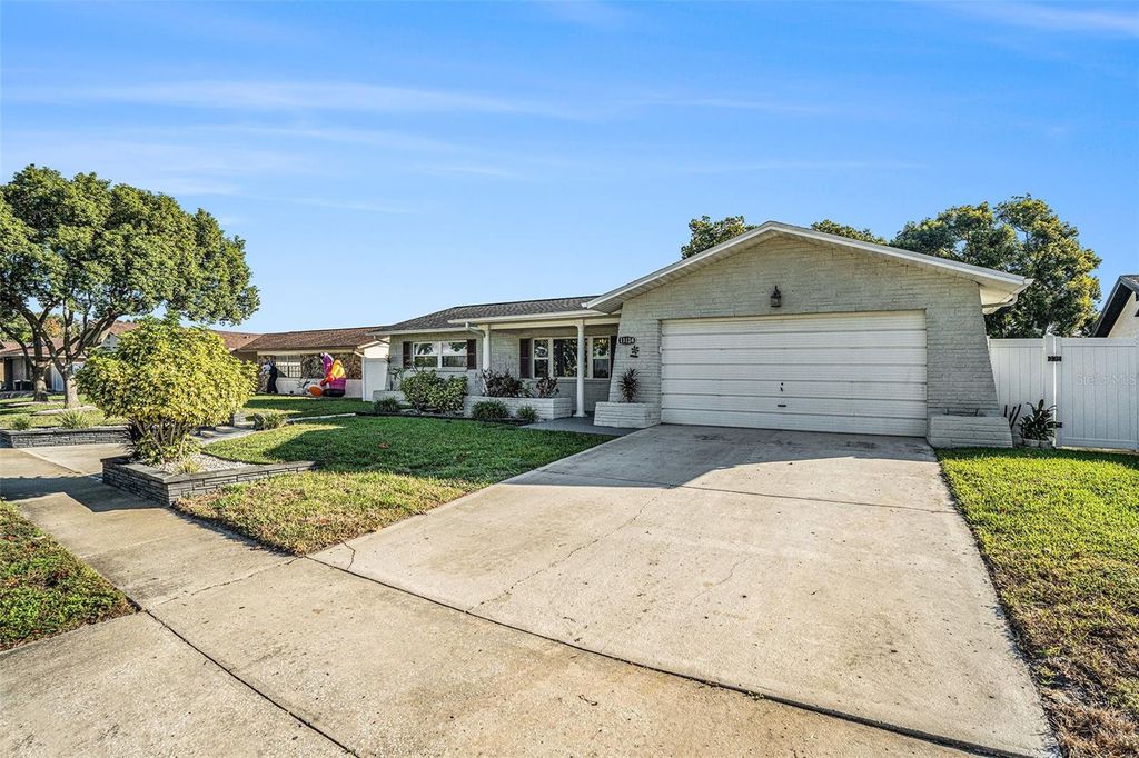 Photo of 11134 Island Pine Drive, Port Richey, FL 34668 (MLS # O6354667)