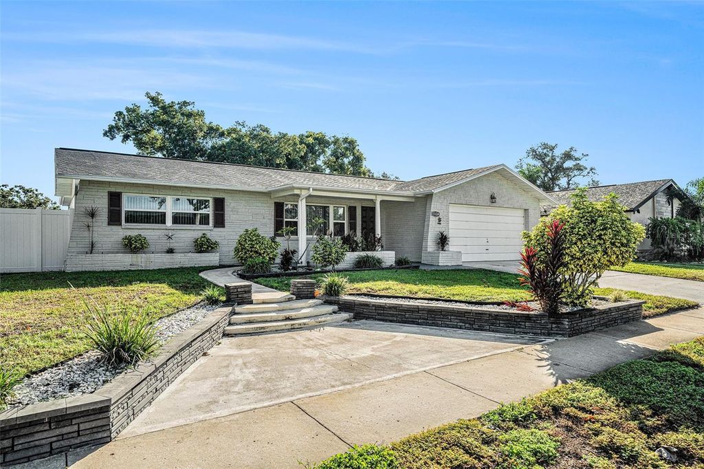 Photo of 11134 Island Pine Drive, Port Richey, FL 34668 (MLS # O6354667)