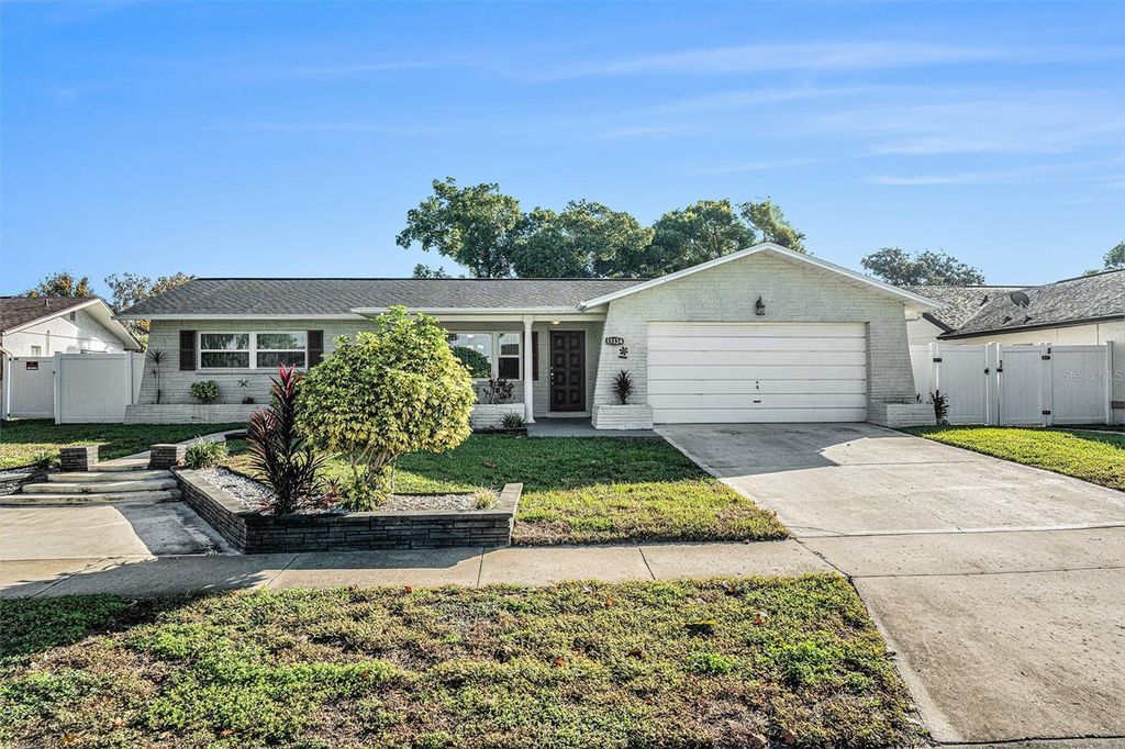 Photo of 11134 Island Pine Drive, Port Richey, FL 34668 (MLS # O6354667)