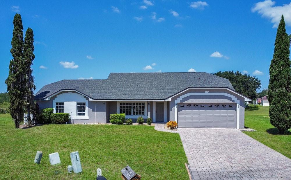 TURNKEY SINGLE STORY POOL Home on one of the LARGEST LOTS in the neighborhood with a classic Florida view of a pond. NEWLY UPDATED BATHROOMS(2025), BRAND NEW ROOF (2025), FRESHLY PAINTED interior/exterior, upgraded BRICK-PAVED DRIVEWAY and SIDEWALK, less than 10 miles to DISNEY WORLD, and nestled in a CUL-DE-SAC. This makes the home perfect for a home owner or investor. Don't miss out on this amazing property. Lot's of new Dining and Shopping in the immediate area making life convenient.