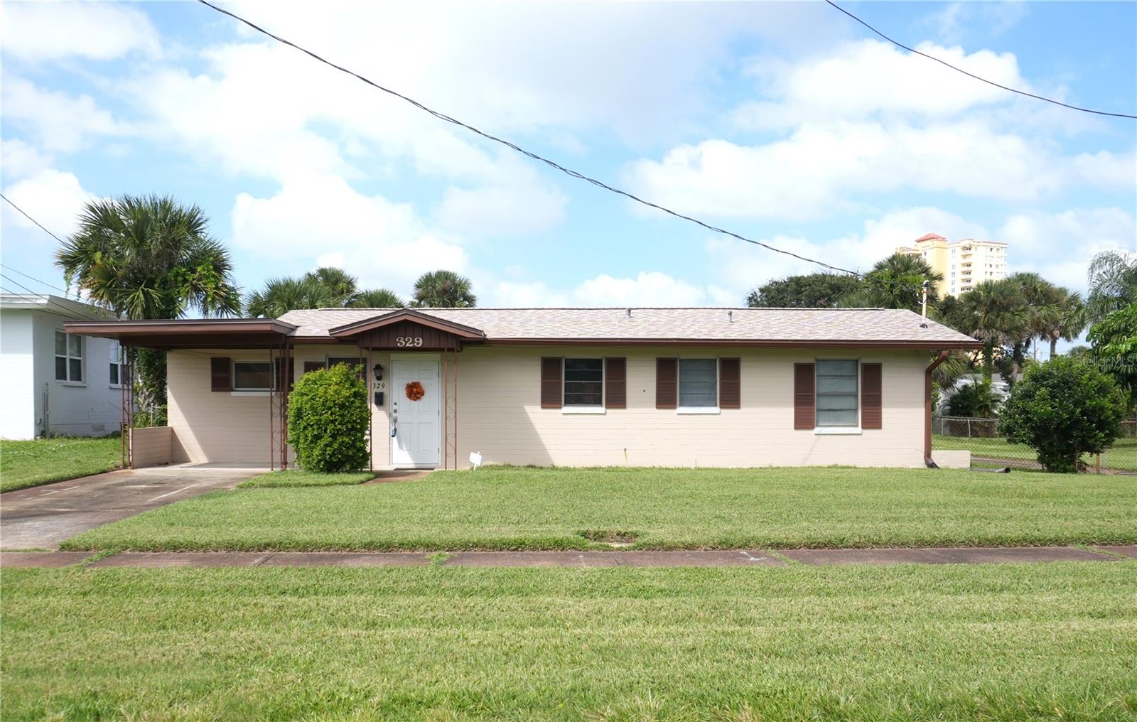 Under contract-accepting backup offers. Discover the potential of a lifetime with this 3-bedroom, 2-bathroom residence in Daytona Beach, just steps from the ocean. Situated on a spacious double lot, this property offers a unique opportunity to create your dream home. Previously impacted by the last hurricane, the house has been stripped to the studs, providing a rare chance to fully customize and rejuvenate the space.
Envision transforming these walls into a contemporary beachside haven or designing an elegant retreat that mirrors your personal style. The expansive lot offers abundant outdoor living possibilities—imagine lush landscaping surrounding a sparkling pool, where you can enjoy the endless Florida sunshine and warm evenings.
Enhancing the property's value is a large detached two-car garage with two 11 foot tall bay doors, ideal for storing beach equipment or serving as a large workshop.