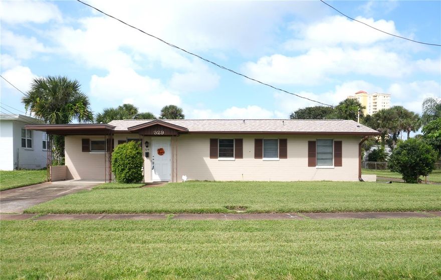 Under contract-accepting backup offers. Discover the potential of a lifetime with this 3-bedroom, 2-bathroom residence in Daytona Beach, just steps from the ocean. Situated on a spacious double lot, this property offers a unique opportunity to create your dream home. Previously impacted by the last hurricane, the house has been stripped to the studs, providing a rare chance to fully customize and rejuvenate the space.

Envision transforming these walls into a contemporary beachside haven or designing an elegant retreat that mirrors your personal style. The expansive lot offers abundant outdoor living possibilities—imagine lush landscaping surrounding a sparkling pool, where you can enjoy the endless Florida sunshine and warm evenings.

Enhancing the property's value is a large detached two-car garage with two 11 foot tall bay doors, ideal for storing beach equipment or serving as a large workshop.