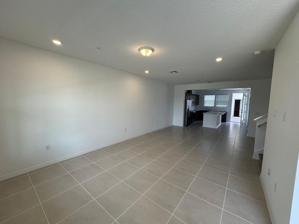Photo of 4561 Orchard View Alley, Clermont, FL 34714 (MLS # O6441295)