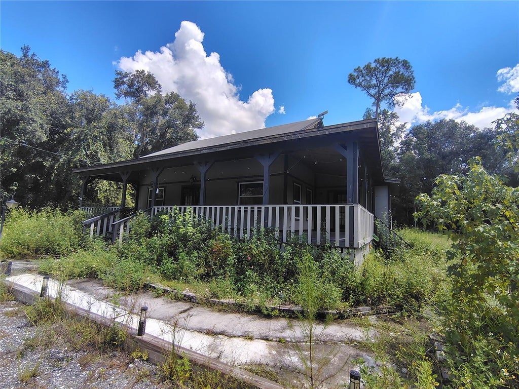 Photo of 12537 SW 38th Way, Webster, FL 33597 (MLS # G5116797)
