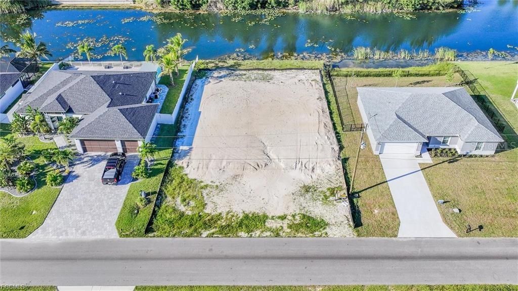 Photo of 31 NE 8th Terrace, Cape Coral, FL 33909 (MLS # D6144182)