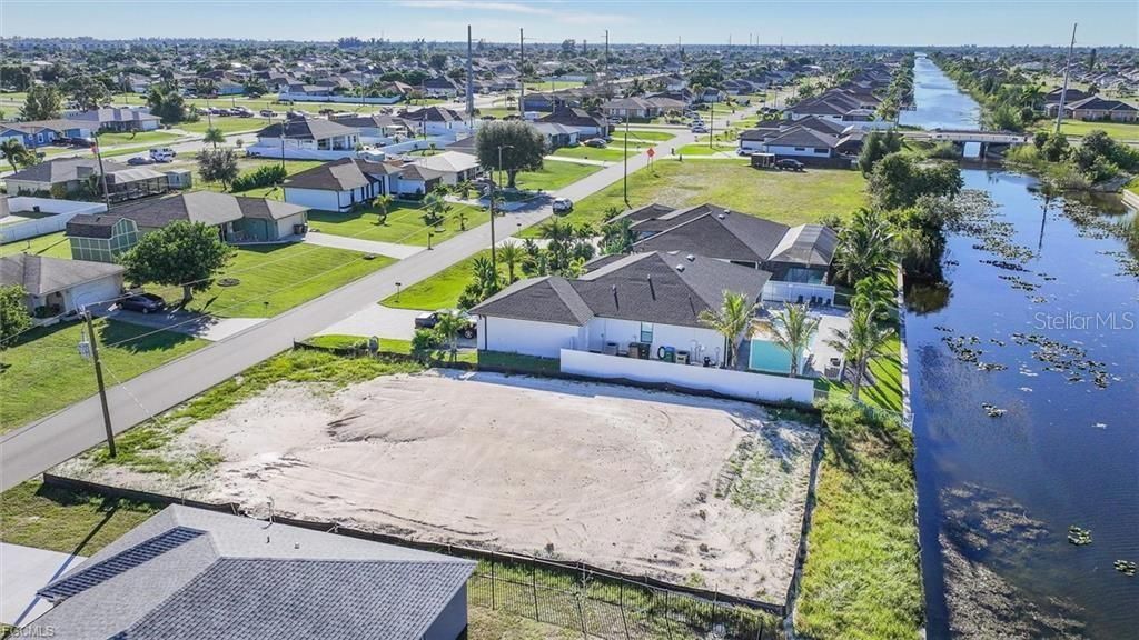 Photo of 31 NE 8th Terrace, Cape Coral, FL 33909 (MLS # D6144182)