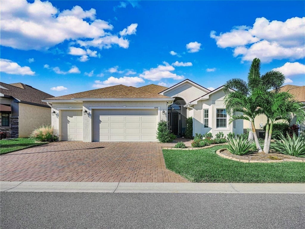 Photo of 6216 Pinehurst Loop, Winter Haven, FL 33884 (MLS # P4940107)