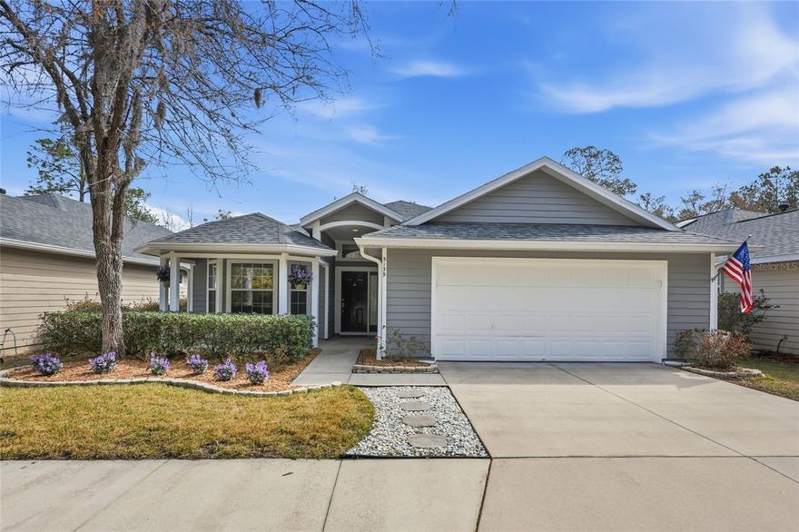 Welcome to resort-style living in sought-after Sorrento; impeccably maintained 4-bedroom, 2-bath home offers a rare combination of dramatic architectural details and major system updates.

You are greeted immediately by a covered front porch with serene conservation wooded views—no front neighbors! Step inside to discover soaring 18-foot ceilings that bathe the common areas and primary suite in natural light. The smart 3-way split floor plan ensures maximum privacy for all. The heart of the home features wood laminate flooring (2022) and a kitchen dressed to impress with a full suite of Frigidaire Gallery stainless steel appliances and a deep single-tub stainless sink (2025).

Truly move-in ready, the heavy lifting has already been done for you: New Roof (2023), Water Heater (2023), HVAC (2019), and fresh Interior/Exterior Paint (2022).

Relax on your screened lanai overlooking the fully fenced backyard, or explore the neighborhood. Sorrento offers fiber-optic internet and resort-style amenities, including a pool with splash pad, tennis/pickleball courts, basketball court, playground, fitness center and nature walks.

This dream home won’t be on the market long. Schedule your showing today!