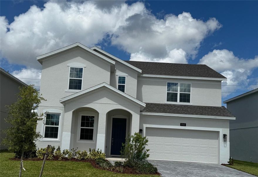 Move right into your dream home with our stunning Newcastle plan—a spacious, move-in ready home designed for modern living! With soaring 9’4” first-floor ceilings and an open-concept layout, this 4-bedroom, 2.5-bath home combines elegance and functionality. The well-appointed kitchen boasts 42" upper cabinets with crown molding, stylish quartz countertops, sleek tile backsplash, and stainless steel appliances—including refrigerator—perfect for entertaining or everyday living. Enjoy gatherings in the spacious Family Room and café area that opens to an extended covered Lanai, ideal for entertaining or relaxing outdoors. The flexible front living room offers space for a home office or den, while the upstairs bonus family room provides endless possibilities for a media or fitness retreat. The luxurious Primary suite features an en-suite bath with dual sinks, quartz counters, and walk-in shower with upgraded wall tile surround and frameless glass enclosure. With thoughtful upgrades like tile flooring in 1st floor main living areas, window blinds throughout, washer & dryer, and a brick paver driveway, this home blends style, comfort, and convenience—ready for you to move in and start living! Zoned for top-rated schools, Harrell Oaks also offers a community park and picnic area, and is conveniently located near local parks, trails, and lakes, along with easy access to shopping and dining.