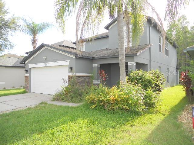 Concord Station is a much desired community for the active lifestyle families in Land O Lakes, Florida. The Master Suite with Modern Private Bath is on the First Floor. The stair to the second floor opens to the Loft surrounded by the other bedrooms. This Home has a Covered Back Porch and a Huge Back Yard perfect for the BBQ and slip n slide. Enjoy the Open Spaces and Community Places or Retreat to your Private Oasis. The Resort Style Amenities include a Clubhouse, Beach Volleyball, Tennis Courts, Basketball Courts, Community Pool, Scenic Trails for Biking or Walking. Centrally Located with easy access to the Veterans Expressway, Tampa Airport, Downtown, Beaches and Boat Ramps you are never too far from the action. Make this place your Special Living Space.