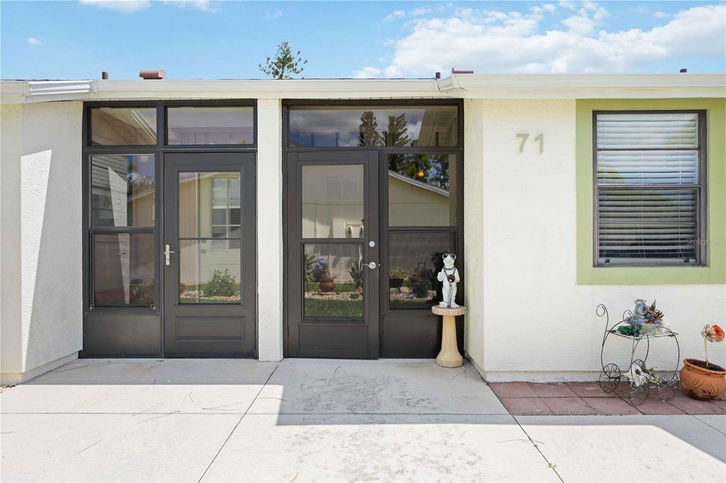 Photo of 6796 Gasparilla Pines Boulevard #71, Englewood, FL 34224 (MLS # C7515209)