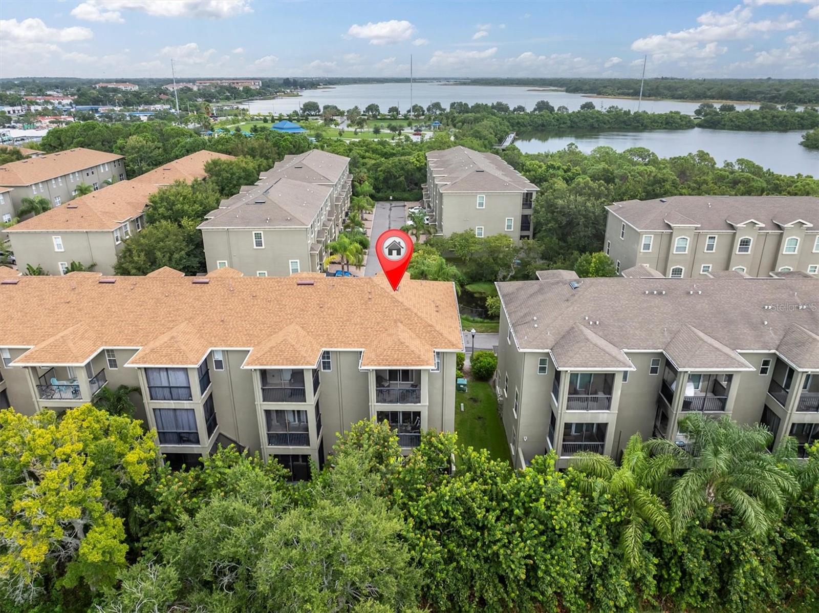 Welcome to Bayou Grande Townhomes, a beautifully maintained gated community in the heart of Seminole. This rare 2007-built corner unit is one of only 12 of this size, 2400 sq ft, that are also constructed entirely with concrete block walls on all sides. Its elevation and design ensured it had no wind or water impact from the hurricanes, providing lasting peace of mind.
Spanning three levels and 2400 sq ft, the home features 3 bedrooms plus a very generous multi-use space/4th bedroom with its own half bath and rear porch—currently being used as an artist’s studio. With 2 full bathrooms, a powder room, and an additional half bath, there’s plenty of room for comfort and convenience. Other thoughtful upgrades include custom pendant lighting, ceiling fans, and two bay windows with seating. Enjoy the owner’s suite with private ensuite bath with jacuzzi tub and walk-in shower with frameless glass door, plus a walk-in closet.
The entertaining kitchen is a true highlight, showcasing Kraftmaid shaker cabinetry, with clever wood drawer-in-drawer storage, custom tile, an LG Door-in-Door refrigerator w/craft ice maker, and a custom banquette for cozy meals. Relax in comfort on your two screened porches plus a lower-level walkout provide inviting outdoor spaces, while the attached 2-car garage offers extra storage.
Practical updates include a 4-year-old roof (maintained by the HOA) and a brand-new 3.5-ton HVAC system (2025). HOA dues also cover landscaping, gated entry, pool access, roof maintenance, trash
Bayou Grande is a hidden gem of just 64 residences Ideally located just 3 miles from the Gulf beaches and steps away from the Beautiful Waterfront Park, the Seminole City Center, and an array of shopping and dining options. This move-in-ready townhome blends style, functionality, and an unbeatable location—offering the best of Seminole living. Fantastic Schools and a friendly lifestyle can be yours. Easy to show!