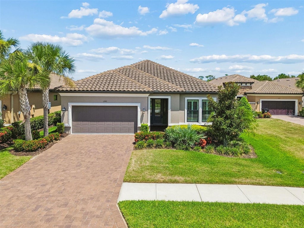 Photo of 11749 Bitola Drive, Odessa, FL 33556 (MLS # W7886826)