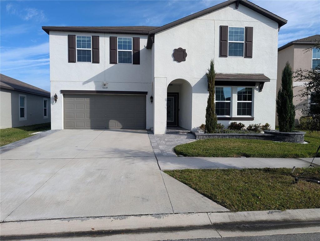 Photo of 31649 Sun Kettle Loop, Wesley Chapel, FL 33545 (MLS # TB8468504)