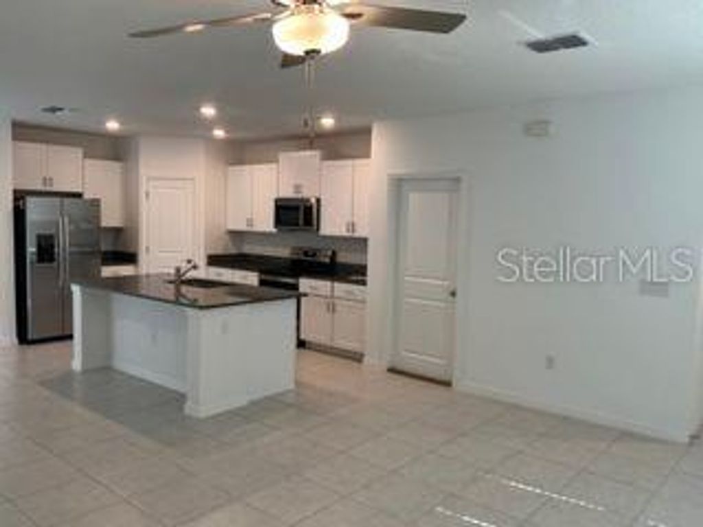 Photo of 113 Rose Bud Lane, Spring Hill, FL 34609 (MLS # TB8474657)