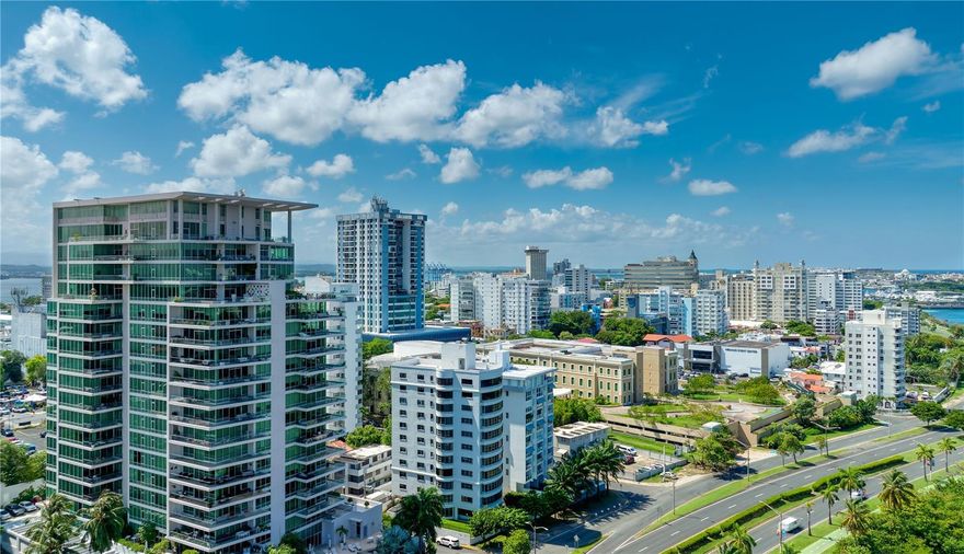Experience refined living at The Cosmopolitan in Miramar, where timeless sophistication meets contemporary design. This stunning residence encompasses a total of 5,332 square feet of living space, including a 1,505-square-foot terrace that captures sweeping views of the Miramar Lagoon, the Condado skyline, and the Atlantic Ocean. Inside, the home offers three spacious ensuite bedrooms, a dedicated office overlooking the lagoon and ocean, and four and a half bathrooms. Every detail exudes craftsmanship, from the Lalique crystal door handles, to the wood-grain paneled powder room with custom crystal finishes. The interiors blend modern lines with classic warmth, creating a space that feels both elevated and inviting. This residence is a rare combination of elegance, function, and flow with natural light, open spaces, and a seamless connection between indoor and outdoor living. The Cosmopolitan Condominium is a full service building and includes concierge service, 24/7 security, an infinity pool, conference room, events space and gym. Set in the heart of The Miramar Arts District, one of San Juan’s most sought-after neighborhoods, The Cosmopolitan offers a lifestyle defined by convenience and culture. Enjoy being moments from fine dining, boutique shopping, theater and art venues, and the Condado Lagoon, while still surrounded by the charm of tree-lined streets and historic architecture. With easy access to Condado, Old San Juan, and the business district, Miramar delivers the perfect balance between city life and serene waterfront living.