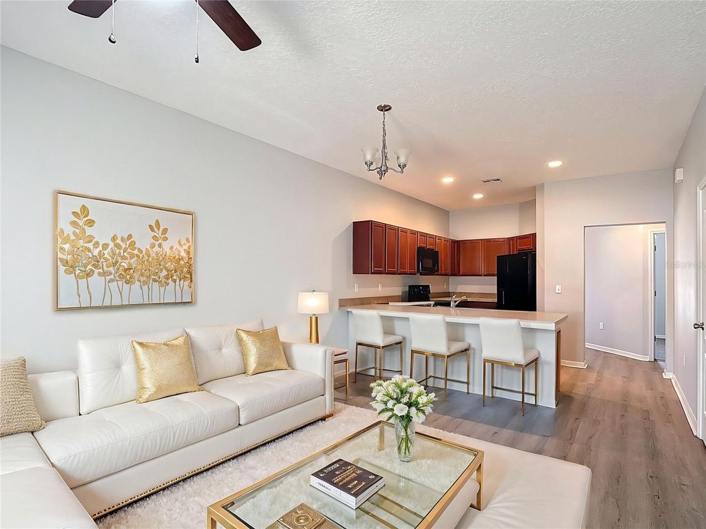 Photo of 1775 Barton Towne Circle, Saint Cloud, FL 34769 (MLS # O6367697)