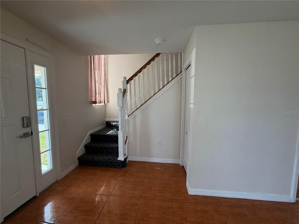 Photo of 701 Bluebill Place #B, Poinciana, FL 34759 (MLS # S5159217)