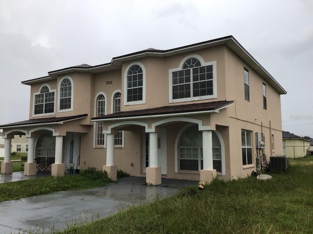 Photo of 701 Bluebill Place #B, Poinciana, FL 34759 (MLS # S5159217)